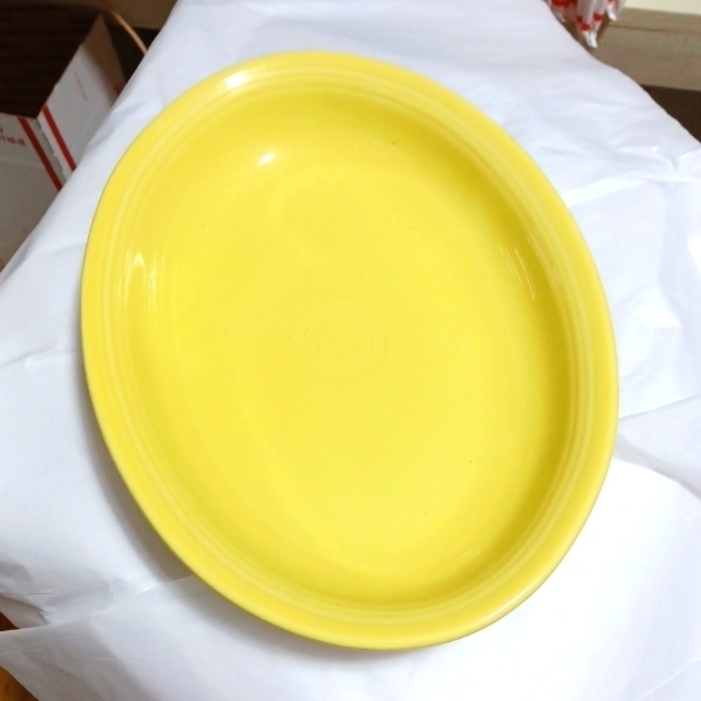 FIESTA OVAL BOWL 12IN. X 9IN. IN A BEAUTIFUL FEISTA YELLOW COLOR